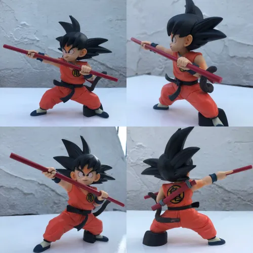 DRAGON BALL GOKU CRIANÇA COM BASTA MÁGICO. 15CM PEÇA ÚNICA