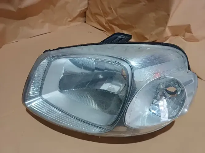 Farol esquerdo Uno Vivace Original foco simples cromado