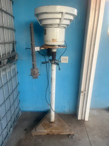 Alimentador de tampa