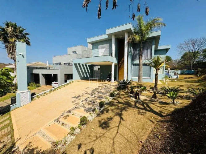 Casa com 4 dormitórios à venda, 310 m² por R$ 3.500.000,00 - Condomínio Figueira Garden - 