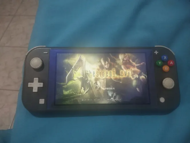 Nintendo Switch Lite desbloqueado| aceito troca em PS4 em boas condições.
