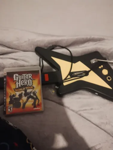 Jogo guitar hero world tour com a guitarra funcionando, mas nao tem caixa