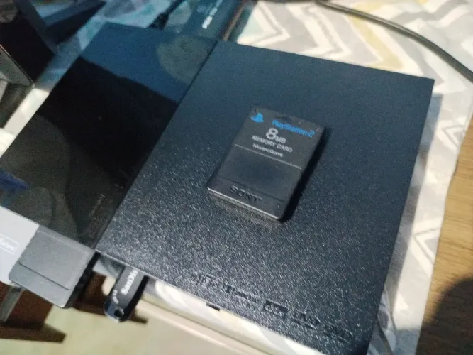 PS2 Completo+Pendrive de 64gb com jogos.