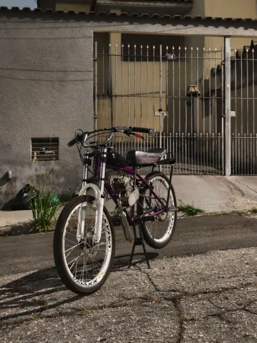 Bicicleta motorizada aro 24 montadinha roxa
