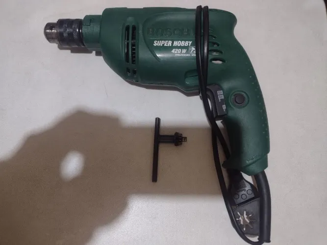 Ferramenta Furadeira Bosh Super Hobby 2 velocidades e martelete