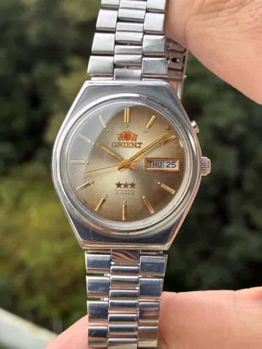 Relógio vintage orient 3 estrelas champagne