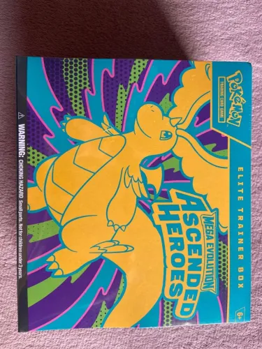 Mega  evolução  acende  heroes  elite treiner box  inglês 