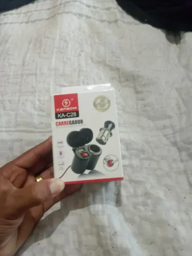 Suporte de carregador para celular novo nunca usado.