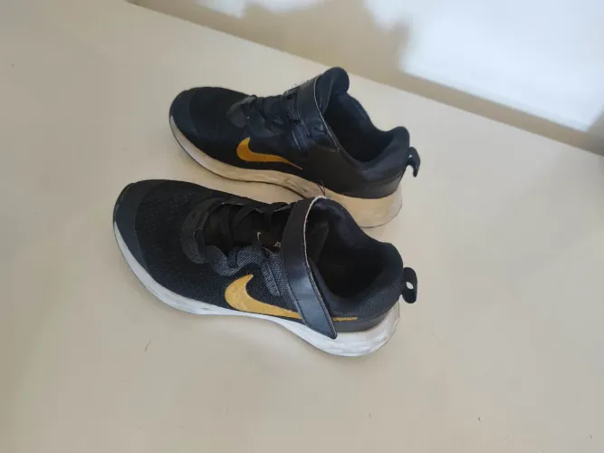 atenis Nike 31