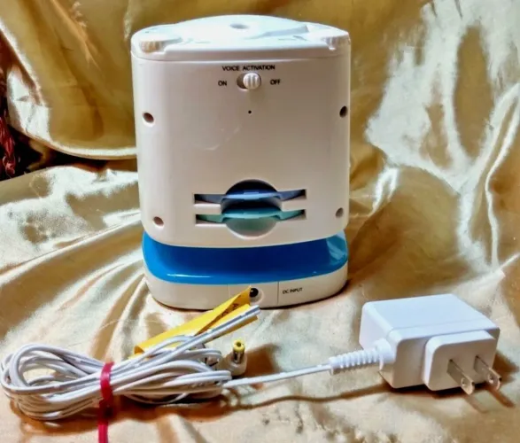 Projetor de berçário Munchkin e sistema de som luz noturna com 3 cartões