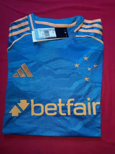 Camisa do cruzeiro III 2025 26 azul com dourado