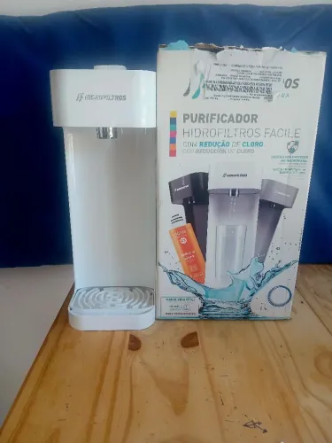 Vendo purificador de agua com redução de cloro na  caixa