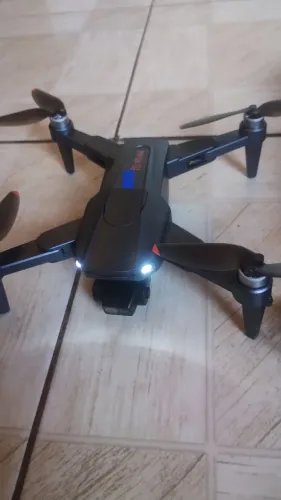 Drone excelente 3bateria guinbal de 3exo case