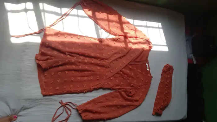 Vende-se macacão cor abóbora $50,00