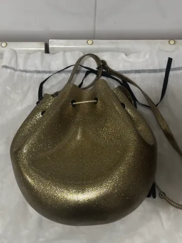 Bolsa Melissa dourada 