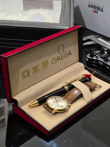 Relógio suíço masculino Omega Genève 35mm vintage com raro kit caneta Omega, estojo e tag