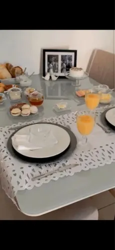 Mesa de vidro com 4 cadeiras