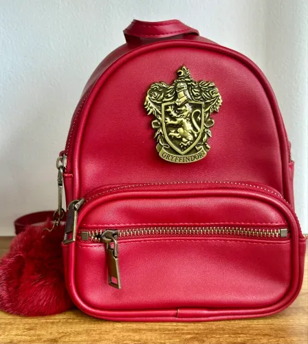 mini mochila original universal studios - Harry Potter - grifinoria