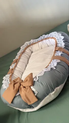 Ninho redutor de bebê