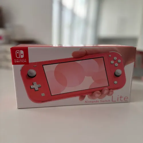 Nintendo Switch Lite Coral (Seminovo) + Caixa + Carregador Original