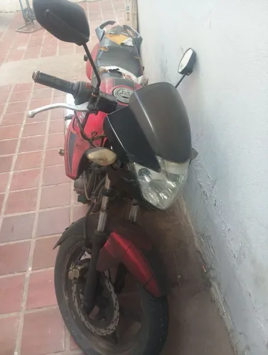 Vendo apache 3 mil .pneu tá furado . é partida eletrica