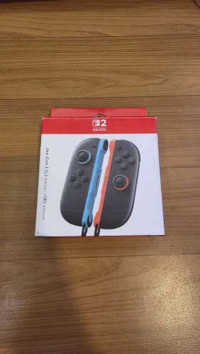 Joy-Cons Originais Nintendo Switch 2 Laranja e Azul