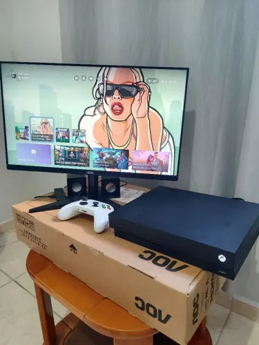 Xbox one X com caixa