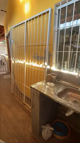Grade de proteção para porta de vidro