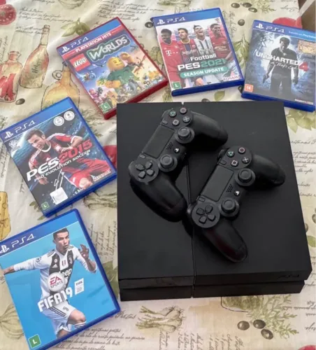 Vendendo PS4 + 2 controles + Jogos