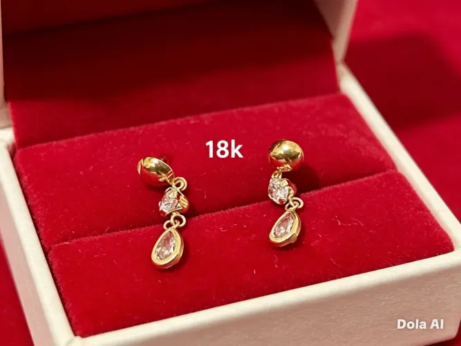 Vendo par de brincos em ouro 18k