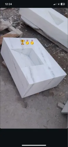 Lavatório esculpido 