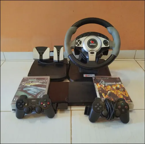 PS2 com volante e jogos