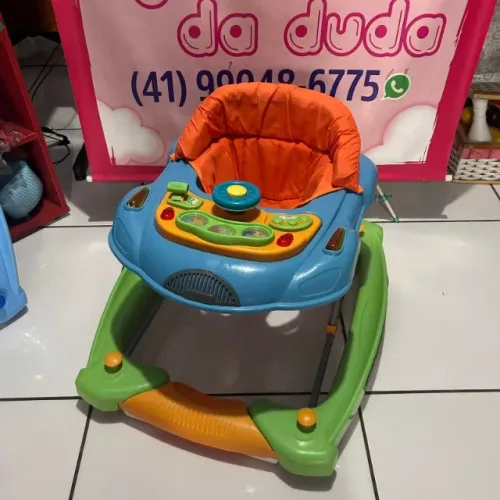Andador 2 em 1 vira balança marca Burigoto bandeja musical semi novo