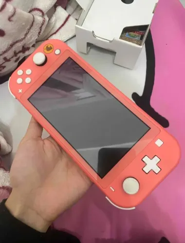 Nintendo Switch Lite Edição Animal Crossing Coral - DESBLOQUEADO