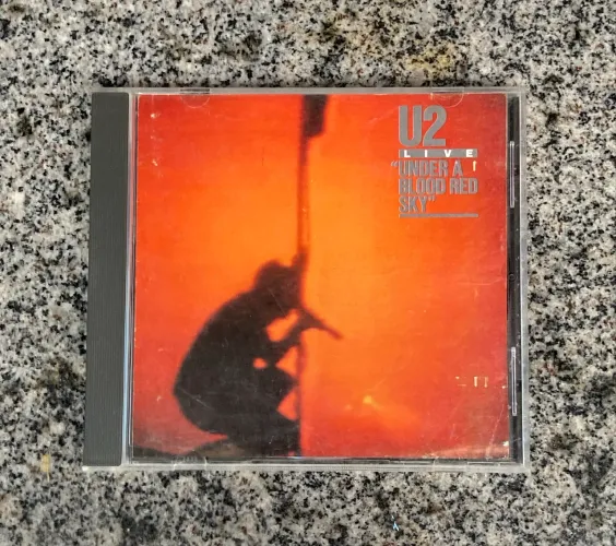 CD U2 - Under a Blood Red Sky (Ao Vivo)