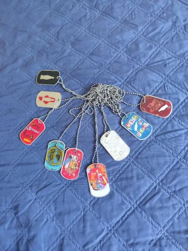 9 un. Tags Hits Coçam Cola
