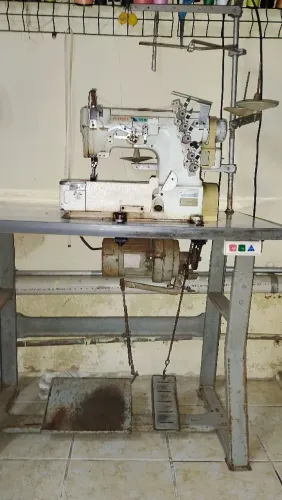 Máquina de costura goleira