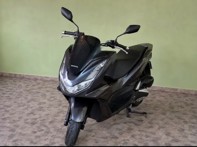 Está a pé por que quer ? Moto zerada!