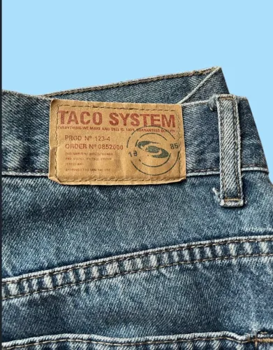 calça jeans taco modelagem reta