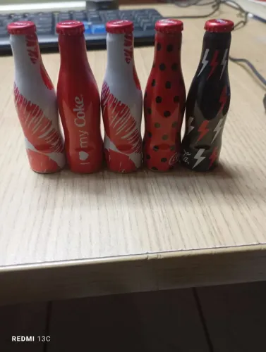 5 mini garrafas coca cola 