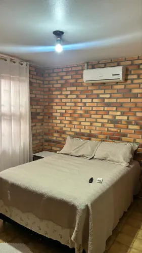 Suíte mensal em casa de família