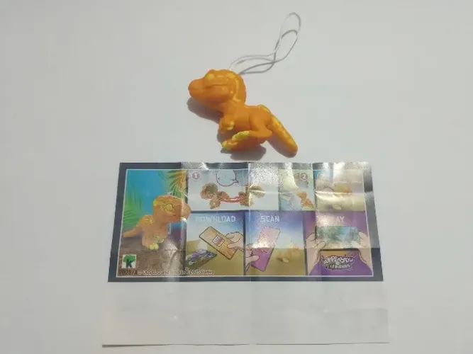 Velociraptor Kinder Joy Mini Funko Pop laranja 