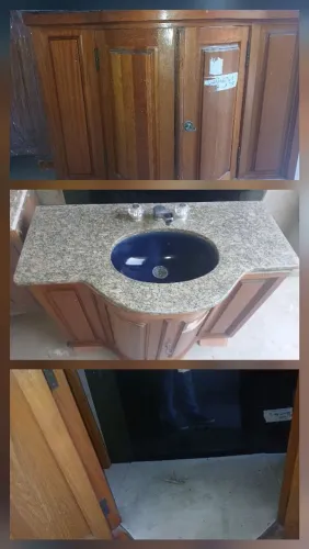 Gabinete de parede 71x100x53 cm acompanha pia de granito com torneiras.