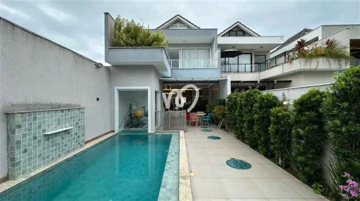 CASA COM 4 SUÍTES NO INTERLAGOS DE ITAÚNA - BARRA DA TIJUCA