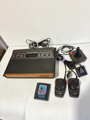 Console Atari 2600 Heavy sixier frente de madeira
