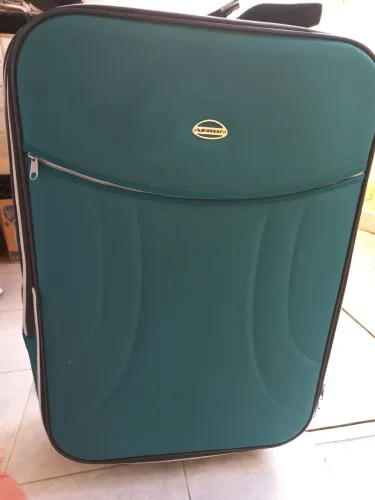 Mala grande 23kgs. Pequena avaria na lateral. Leia o anúncio. 