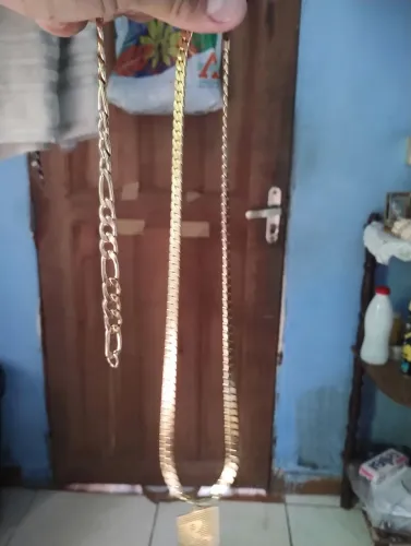 Vendo um cordão de aço e uma pulseira de aço banhada ouro