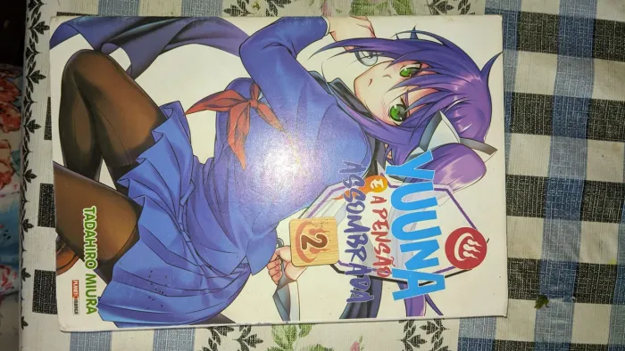Vendo mangá Yuuna e a pensão assombrada vol2