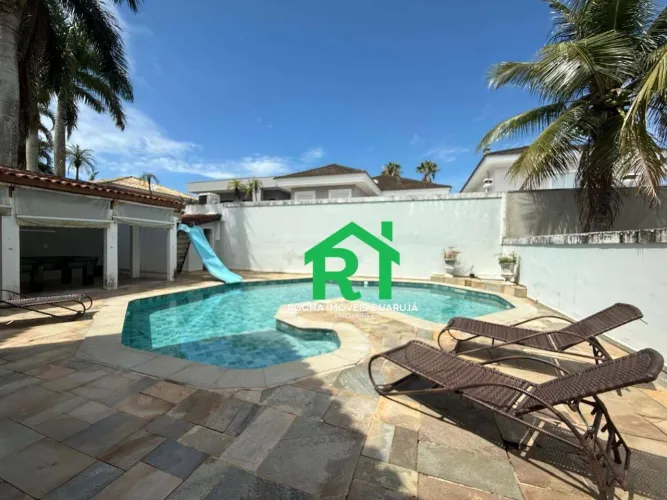 Casa à venda no Condomínio Jardim Acapulco com piscina e espaço gourmet Guarujá/SP