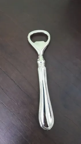 Antigo abridor de garrafas Italiano.